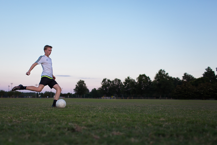 Boy playing soccer
